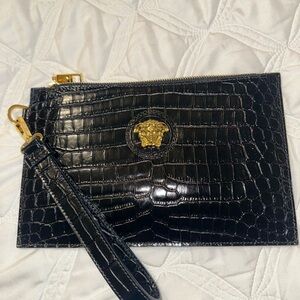Wrist bag new never worn black 100% authentic 9 1/2” by 6”